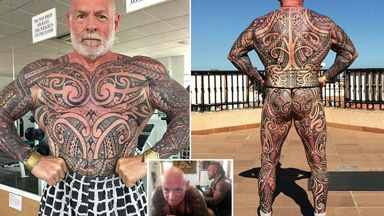 Bodybuilder tattoos entire body black