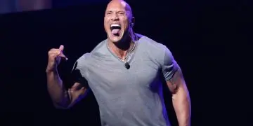Dwayne Johnson Kicks It Back To The ’90s When He Had A Flattop, Turtleneck & Fanny Pack