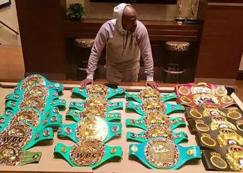Floyd Mayweather Shows Off Incredible Haul of World Titles as Conor McGregor Talks Continue