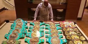 Floyd Mayweather Shows Off Incredible Haul of World Titles as Conor McGregor Talks Continue