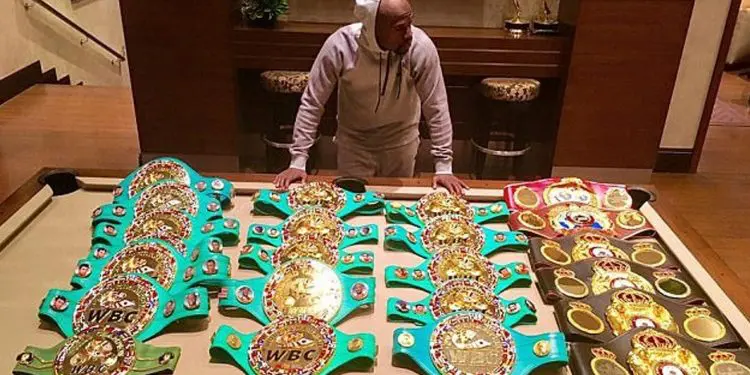 Floyd Mayweather Shows Off Incredible Haul of World Titles as Conor McGregor Talks Continue