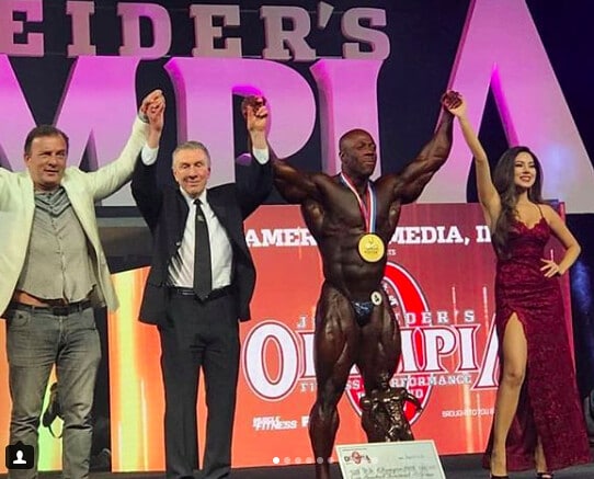 IFBB Pro League President Jim Manion with Shawn Rhoden at Olympia 2018