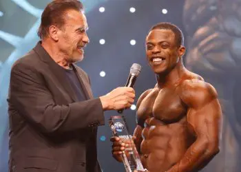 Men's Physique Winner Andre Ferguson With Gov Arnold Schwarzenegger
