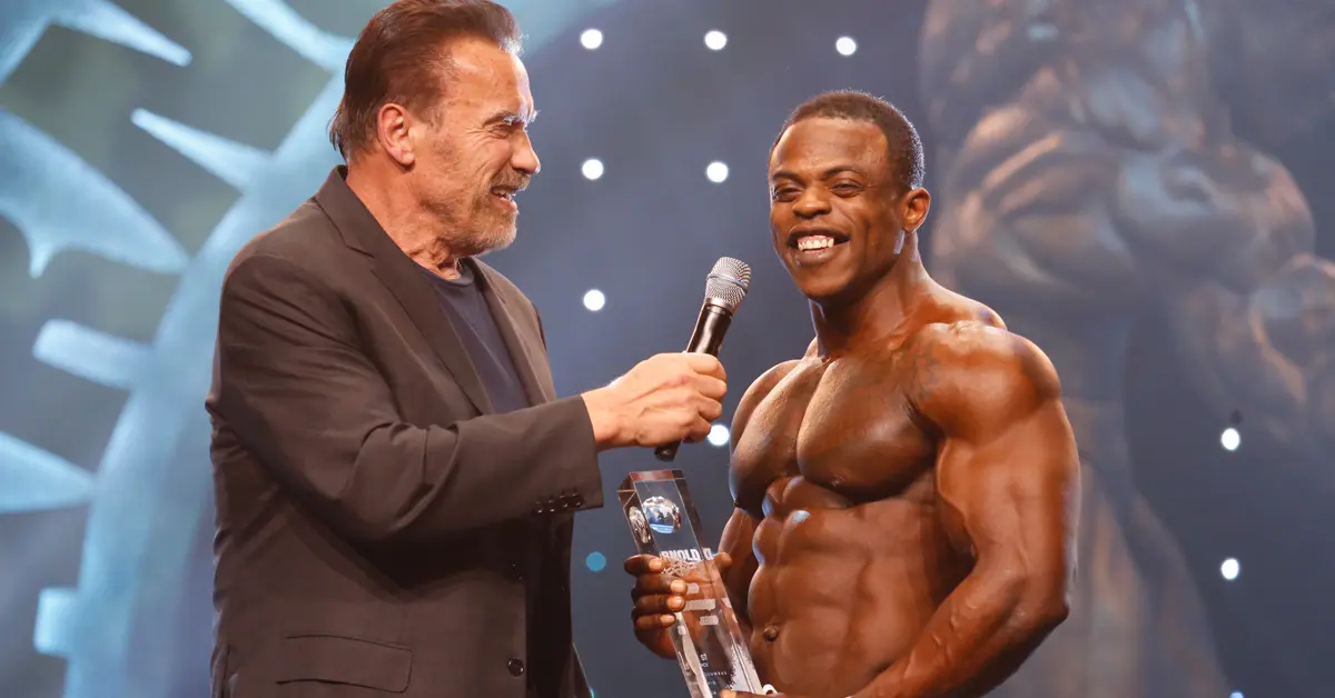 Men's Physique Winner Andre Ferguson With Gov Arnold Schwarzenegger