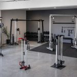 Cable crossover machines arranged in a FitnessVolt home gym review scene