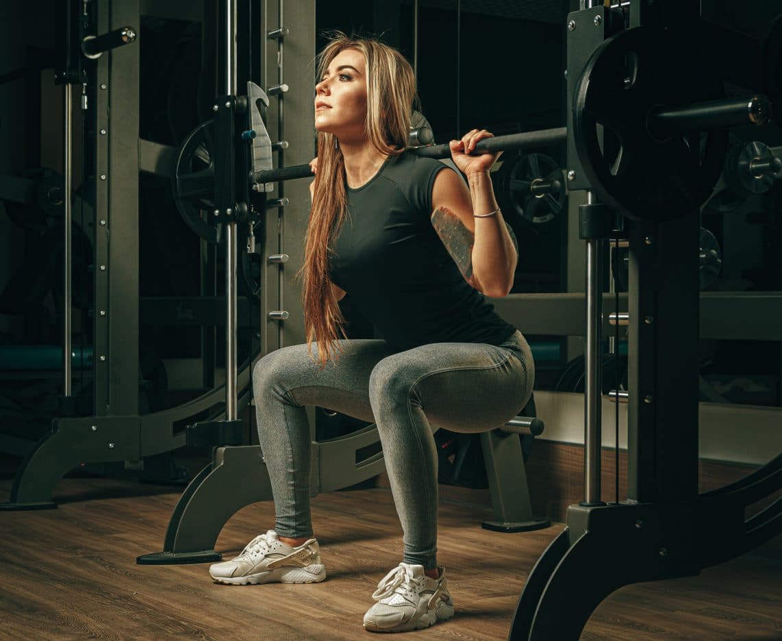 Smith machines vs. free weight power racks: pros and cons