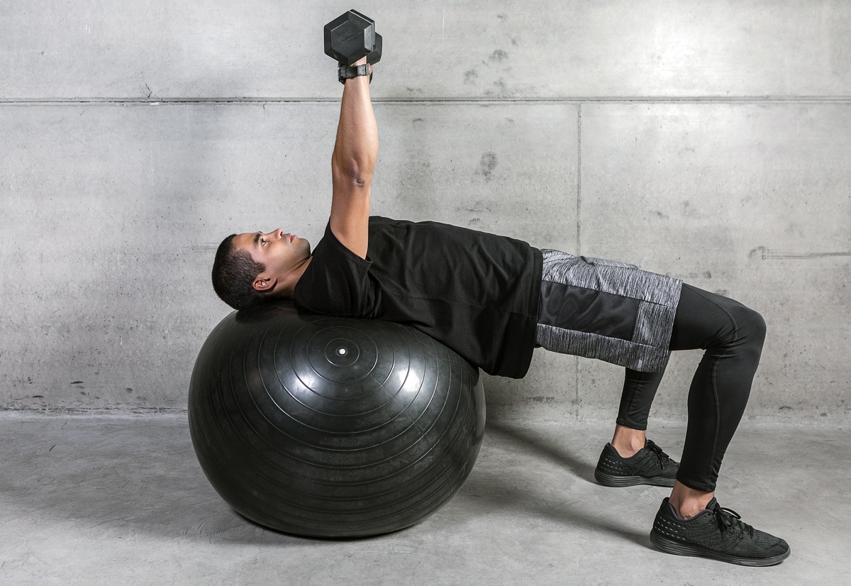 The 10 Best Dumbbell Chest Exercises You Can Do Without a Bench