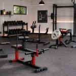 Calf raise machines arranged in a FitnessVolt home gym review scene