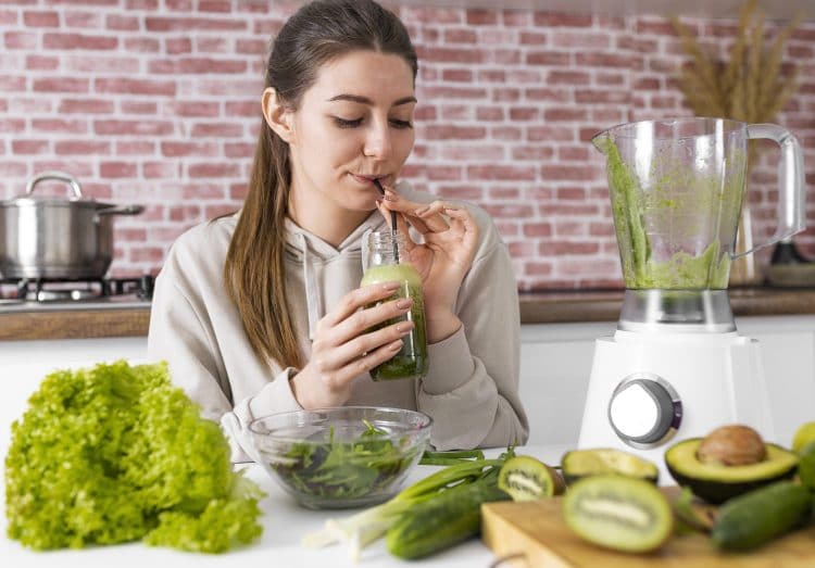 Woman Drinking Green Smoothie