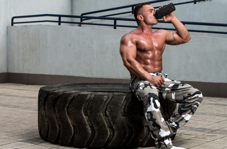 Bodybuilder Drinking Protein