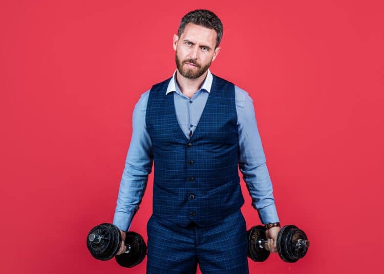 Dumbbell Exercise In Formal Suit
