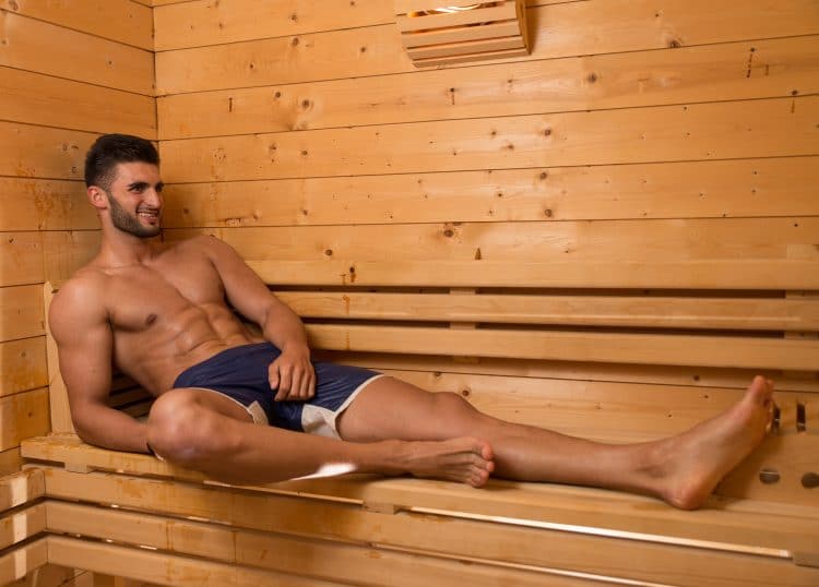 Man Relaxing In Sauna