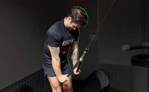 Powerlifting Coach Enrique Santatecla Perform The Standing Cable Pullover