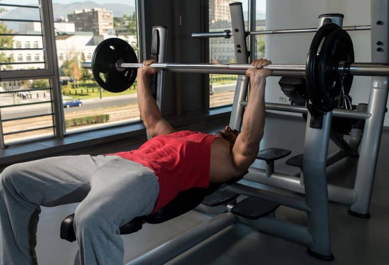 Bench Press Shoulder Pain: Types, Causes, Symptoms, & How To Prevent