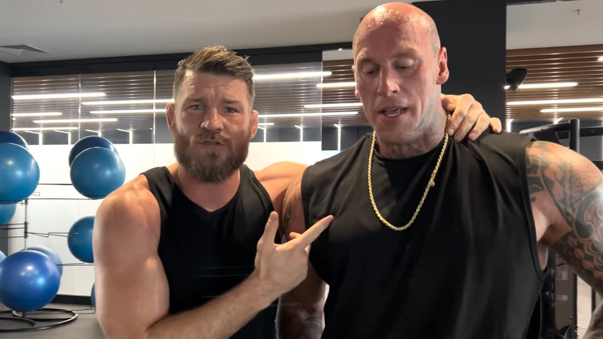 Watch how UFC legend Michael Bisping stays in shape in his 40s as he lifts  weights with British strongman Martyn Ford