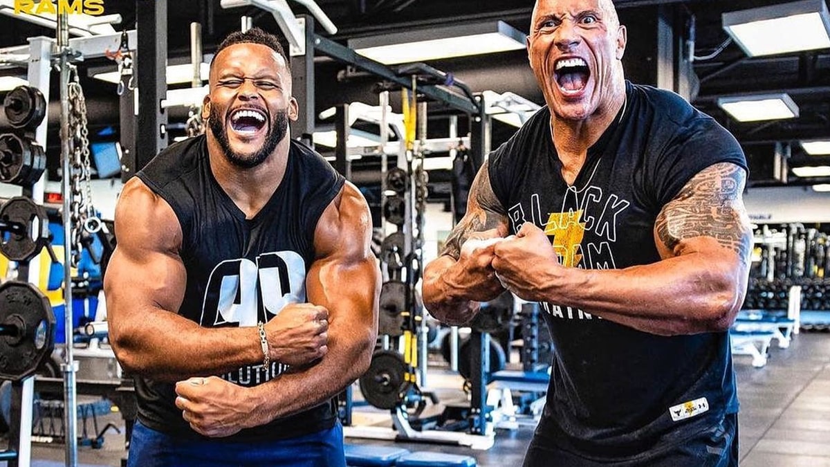 Dwayne 'The Rock' Johnson Crushes a Brutal Ab Wheel Rollout Workout With  NFL Player Aaron Donald – Fitness Volt