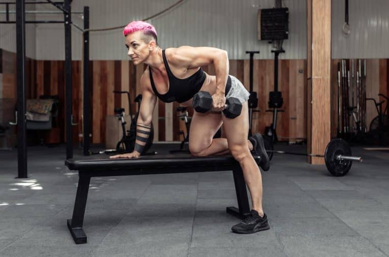 Woman Doing Dumbbell Row Exercise