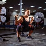 Doing Squats With Barbell