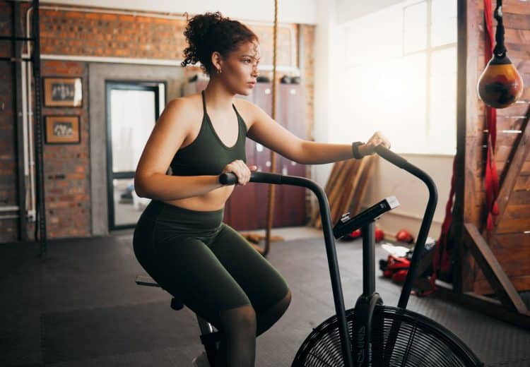 Woman At Gym For Cardio Training