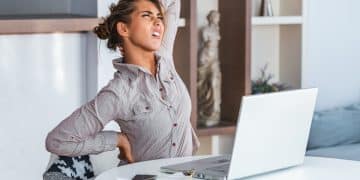 Woman Suffering From Back Pain