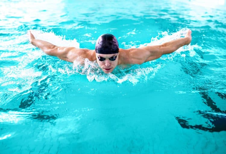 Muscular Athlete Swimming