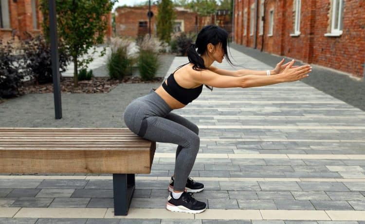 Woman Doing Bench Squats