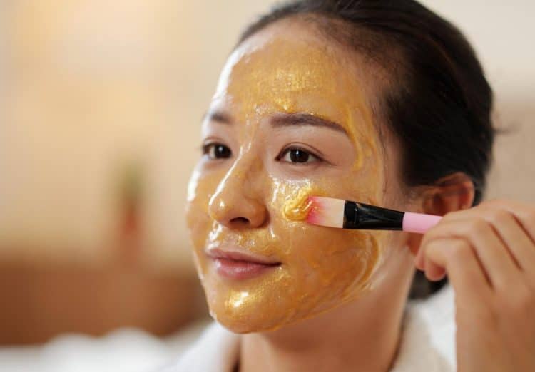 Woman Applying Honey Mask