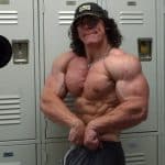 Sam Sulek Side Chest Pose