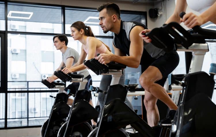 People Doing Indoor Cycling