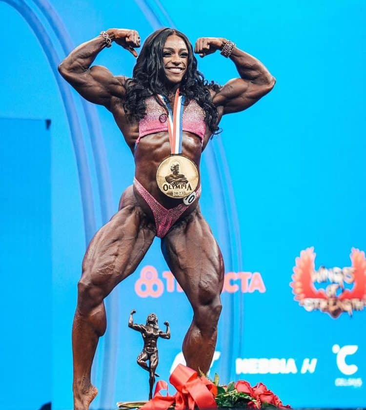 Andrea Shaw Posing After Winning Ms Olympia 2023