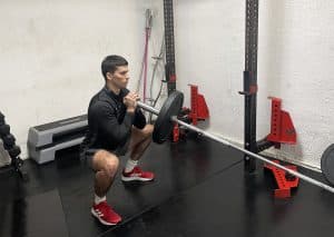 Master Landmine Squats: Target Your Quads, Glutes, and Core!