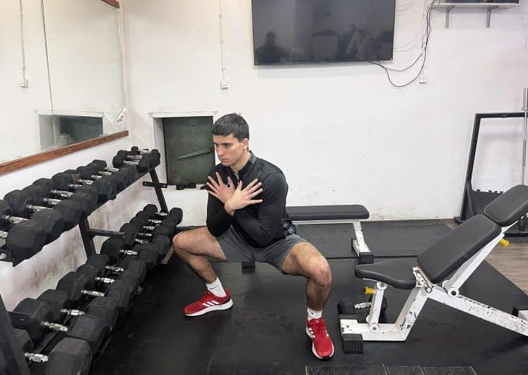 Lower Into The Deep Sumo Squat Position