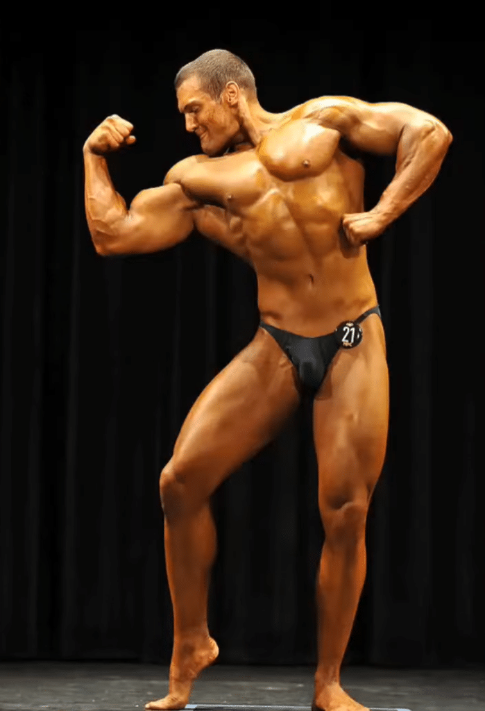 Evan Singleton doing bodybuilding