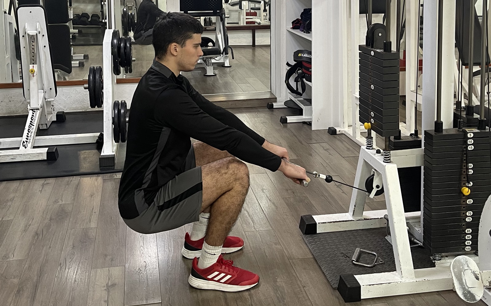Cable Leg Extension Exercise Guide — How to, Benefits, and More
