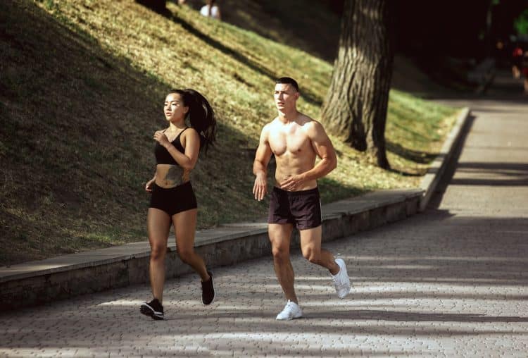 Couple Jogging In The Park