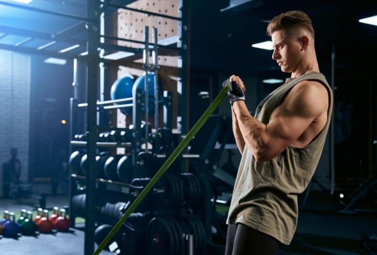 Man Training Arm With Resistance Band
