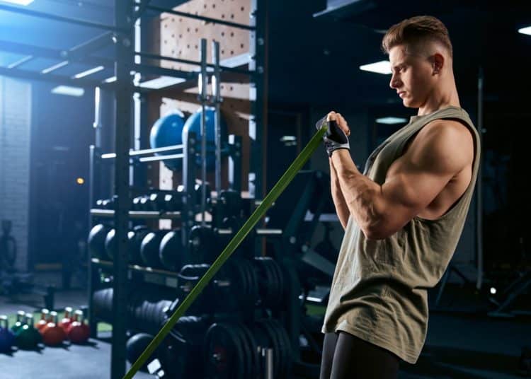 Man Training Arm With Resistance Band