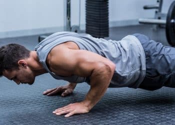 Hollow Body Crunch Guide: Muscles Worked, How-To, Benefits, and