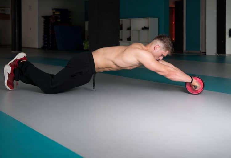 Man Exercise With Ab Roller
