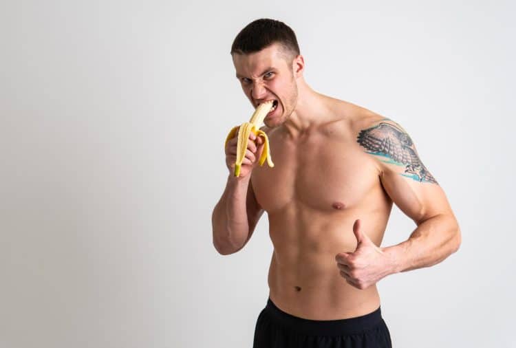 Fit Man Eating Banana