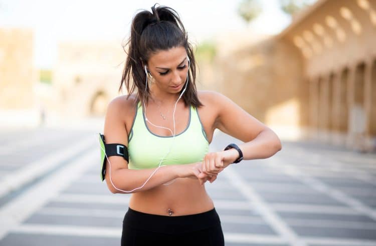 Woman Checking Her Heart Rate With Smart Watch