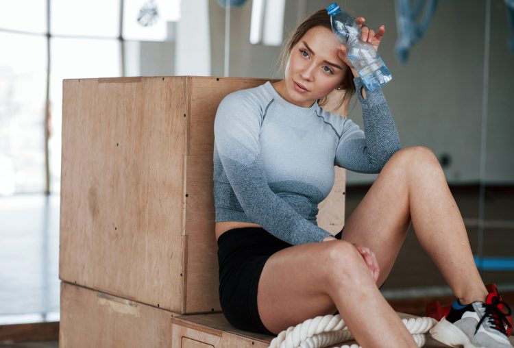 Woman Resting in Gym