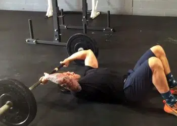 Floor Tricep Barbell Extensions