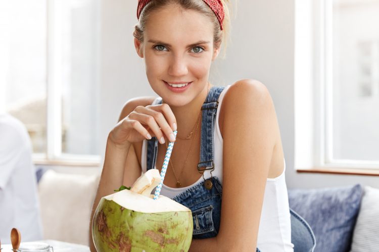 Woman Drinking Coconut Water