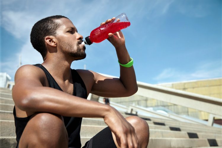 Young Man Drinking Sports Drink