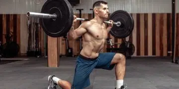 Bodybuilder Doing Barbell Lunges