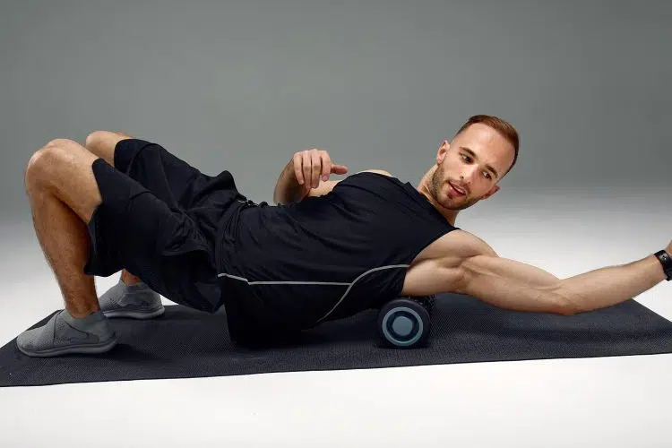 Man Foam Rolling