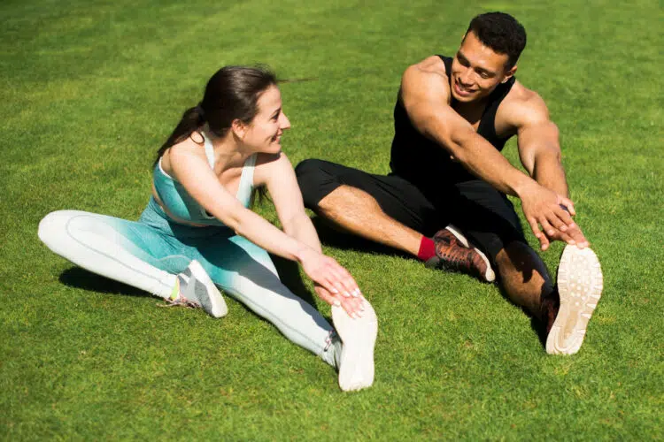 Couple Stretching Outdoor