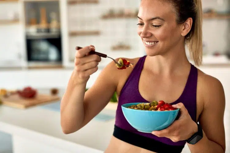 Happy Woman Having Fruit Salad