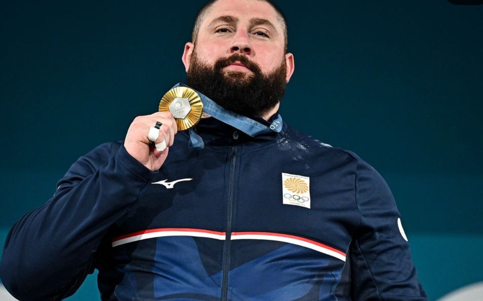 Lasha Talakhadze Wins Third Consecutive Olympic Gold Medal at 2024